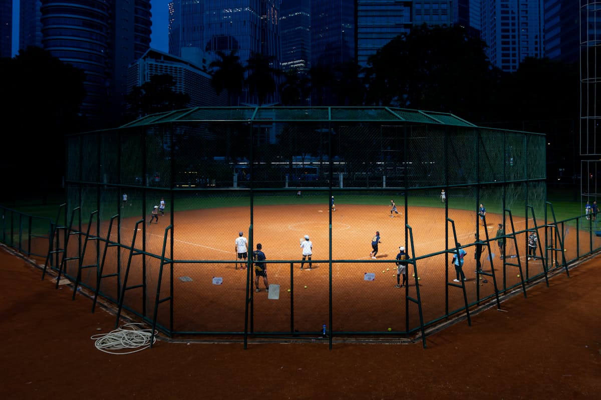 Ball diamond glowing under the lights at night